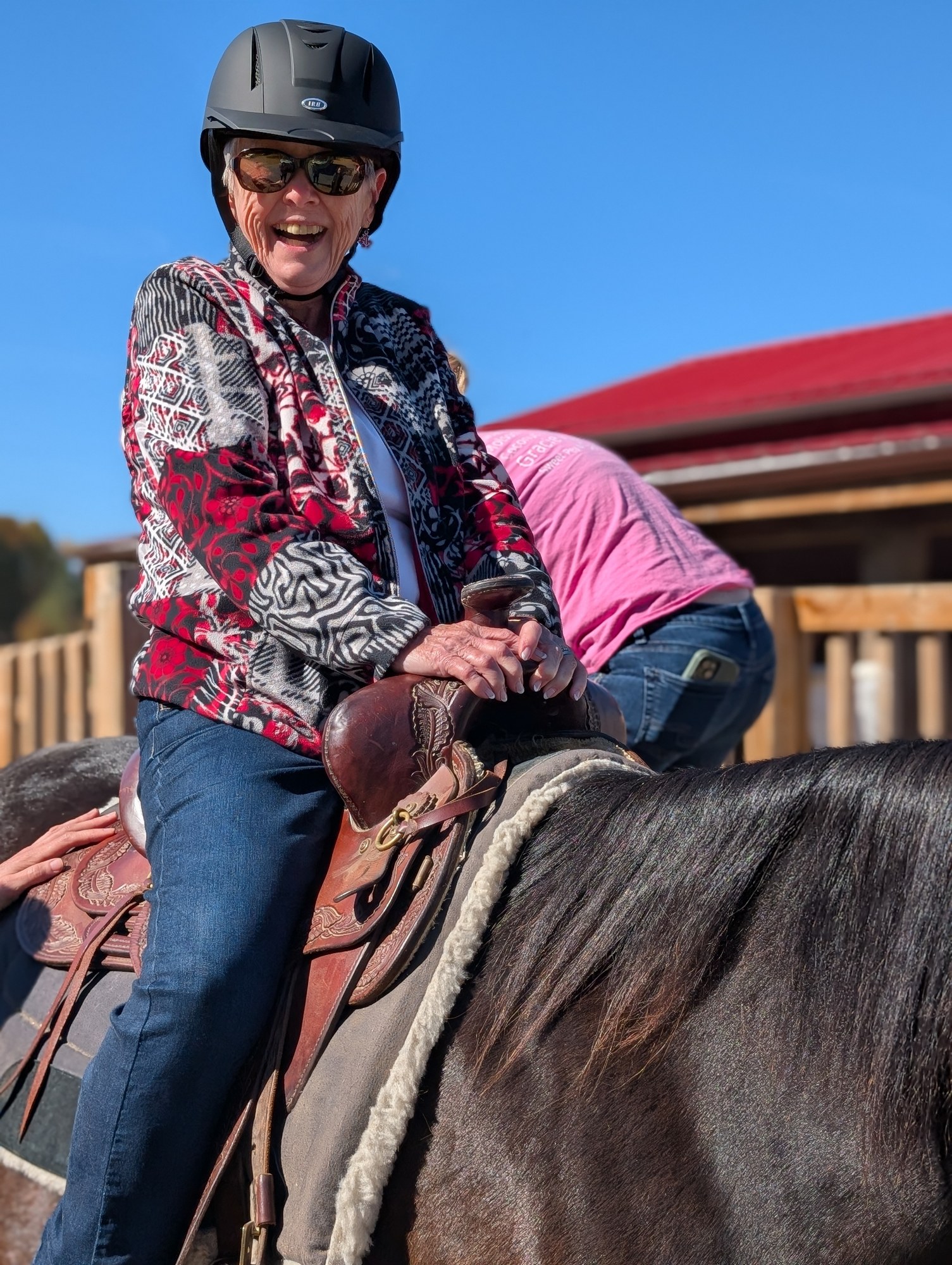 A resident horseback riding